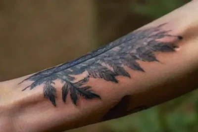 Close-up of detailed tattooed forearm
