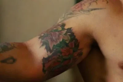 Lifelike tattooed arm in cozy studio